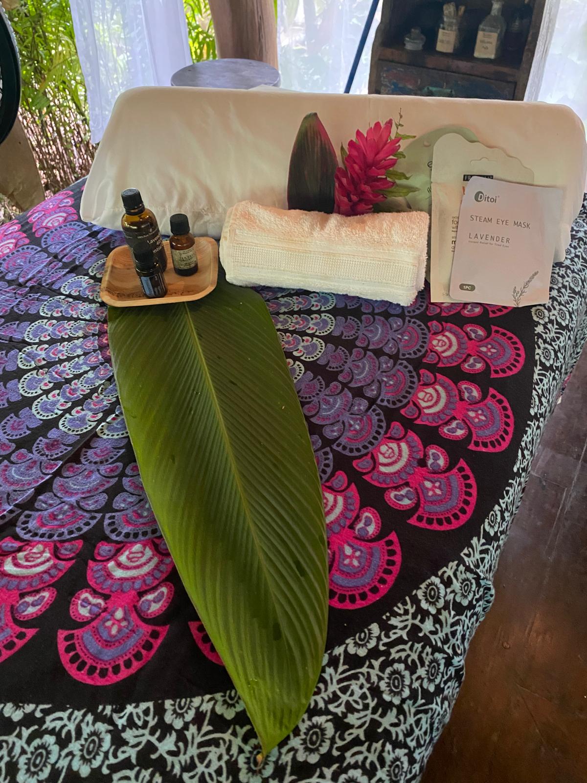Couples massage tables side-by-side in the open-air cabana