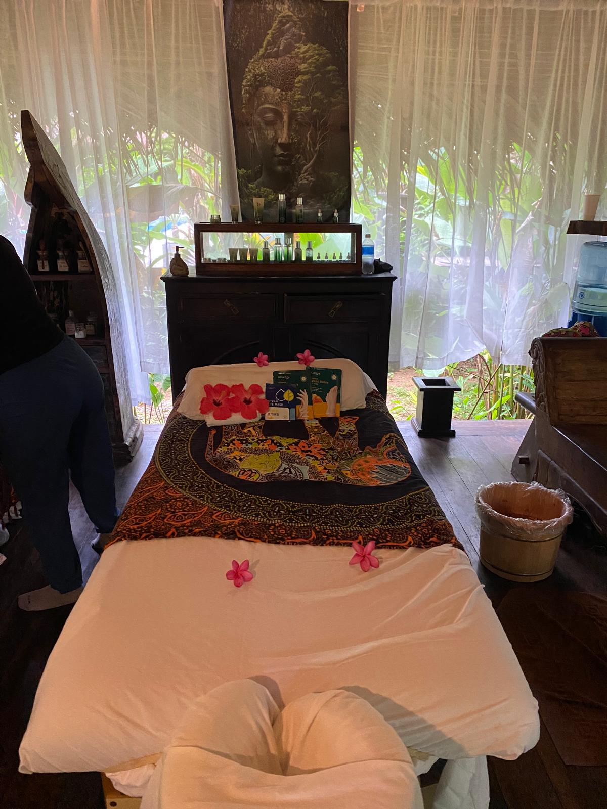 Couples massage table in the open-air rainforest cabana