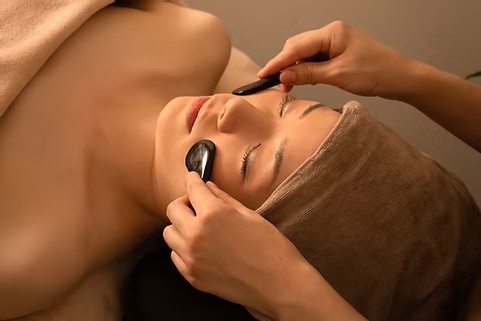 Relaxing Facial with gua sha stones at Bluff Beach Jungle Spa